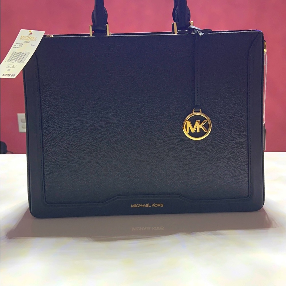 Authentic NWT Michael Kors Black hand bag come with longer strap.